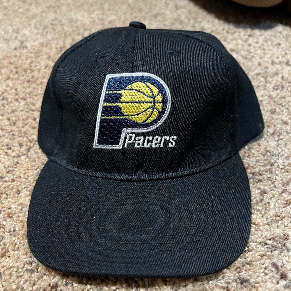 Two never worn pacer hats.